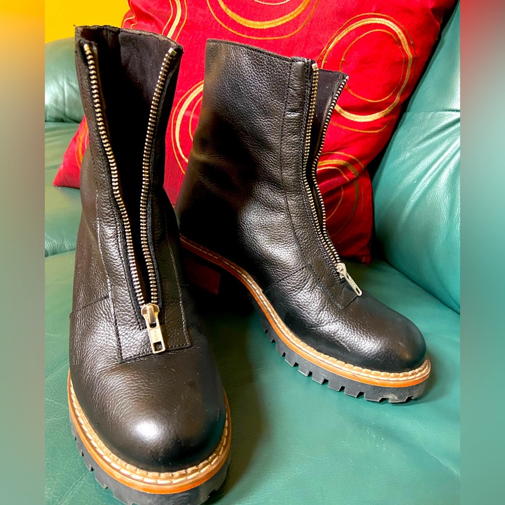 Black, made In Spain , low cut boots with zipper in front. Good condition.